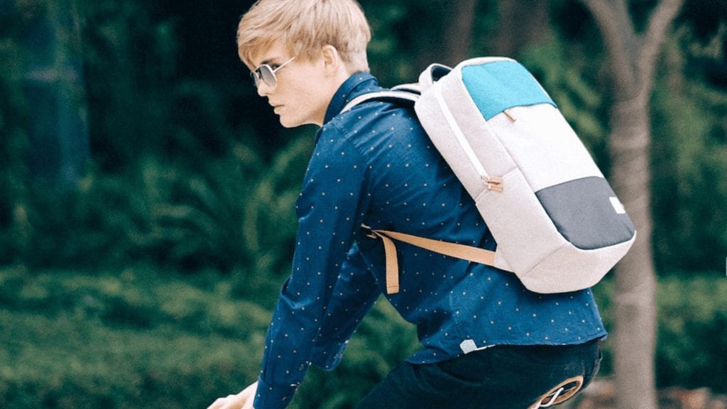 Young Man Wearing Nifteen Backpack